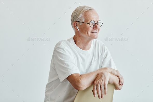 Modern Senior Man with Earphones