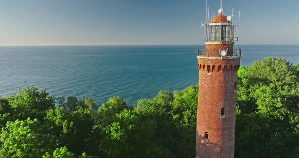 Lighthouse by Baltic Sea in summer, Aerial view of Poland alt