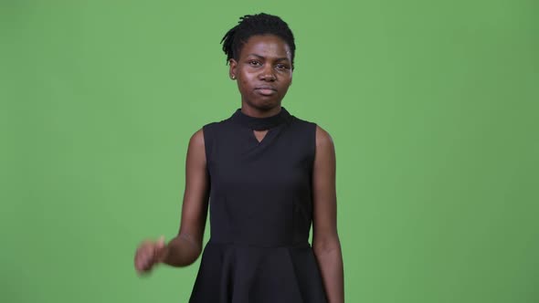 Young Upset African Businesswoman Giving Thumbs Down