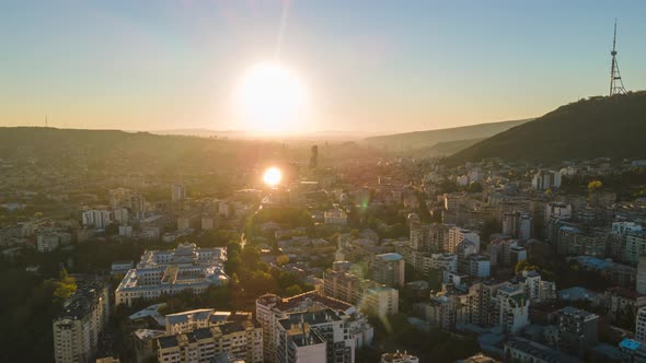 Aerial hyperlapse of beautiful cityscape of Tbilisi at sunrise, Georgia 2021 alt