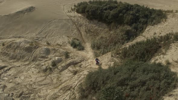 Enduro Motorcycle Rides Offroad on the Sands by SkyLifeCinema | VideoHive