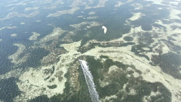Kitesurfing Near the Shore of Zanzibar Tanzania alt