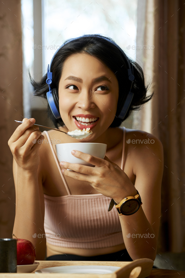 Woman Enjoying Tasty Breakfast
