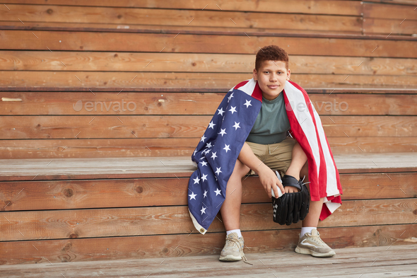 College Baseball Player With American Flag - Stock Photo - Images