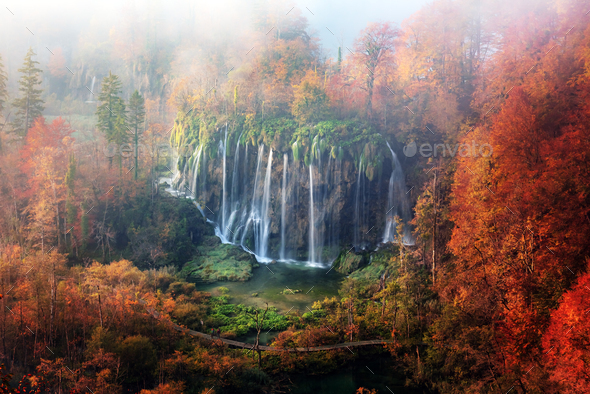Aerial view on amazing foggy waterfall in Plitvice lakes - Stock Photo - Images