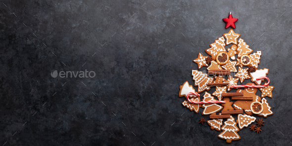 Christmas card with fir tree shaped gingerbread cookies - Stock Photo - Images