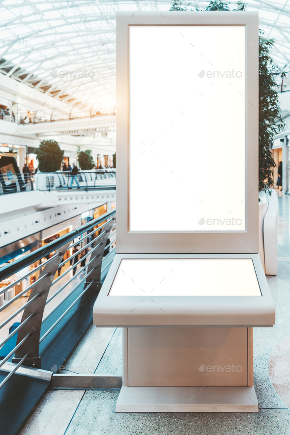 Digital ad poster mockup in a mall