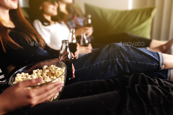 Friends Drinking Soda While Watching Movie High-Res Stock Photo - Getty  Images