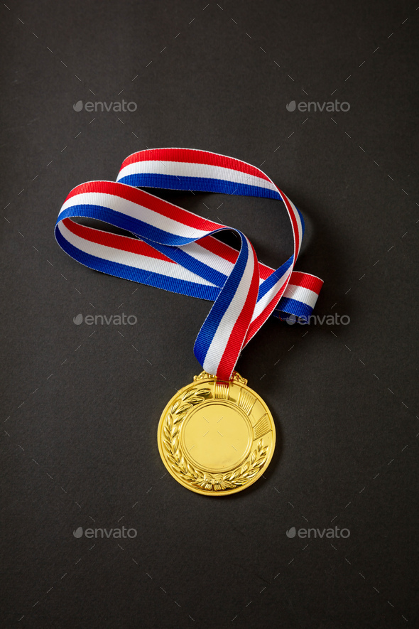 Gold medal. Champion trophy award and ribbon. Prize in sport for