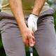 Young golfer hitting golf ball on a course - PhotoDune Item for Sale