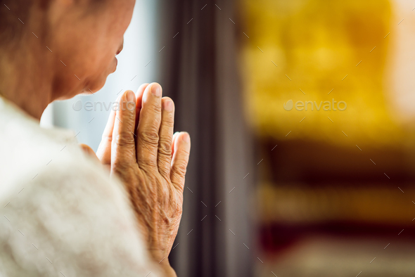 Close up Grandmother\'s hand pray respect for faith spirituality