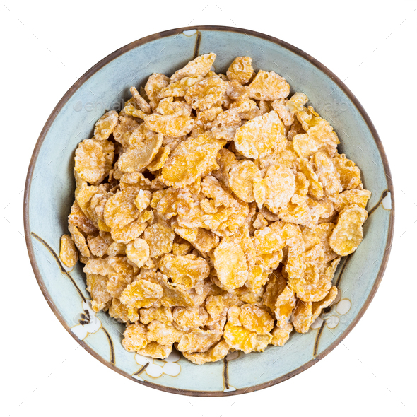 sugar coated cornflakes in round bowl isolated