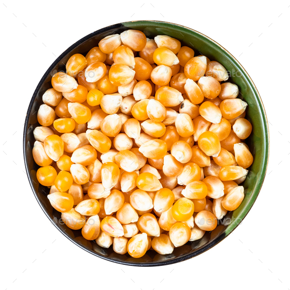 raw maize corns in round bowl isolated on white