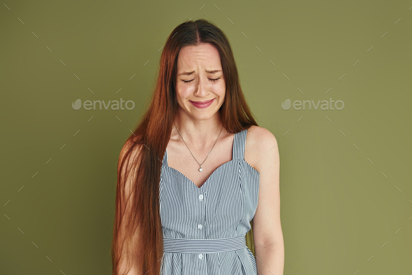 Young casual fashion beautiful girl standing in studio Stock Photo