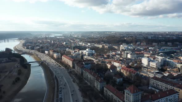 AERIAL: Sunny Day Above European Capital of Culture 2022 Kaunas City with Nemunas River alt