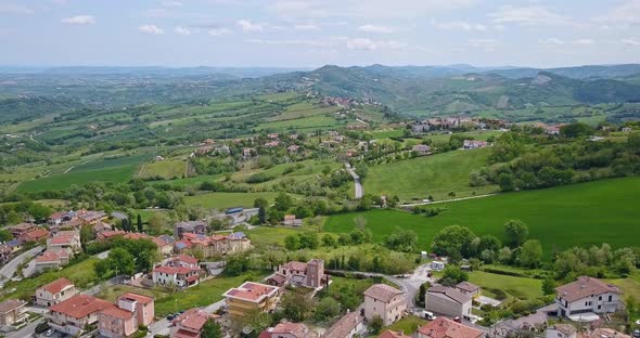 Aerial View Of A Small Town And Green Fields