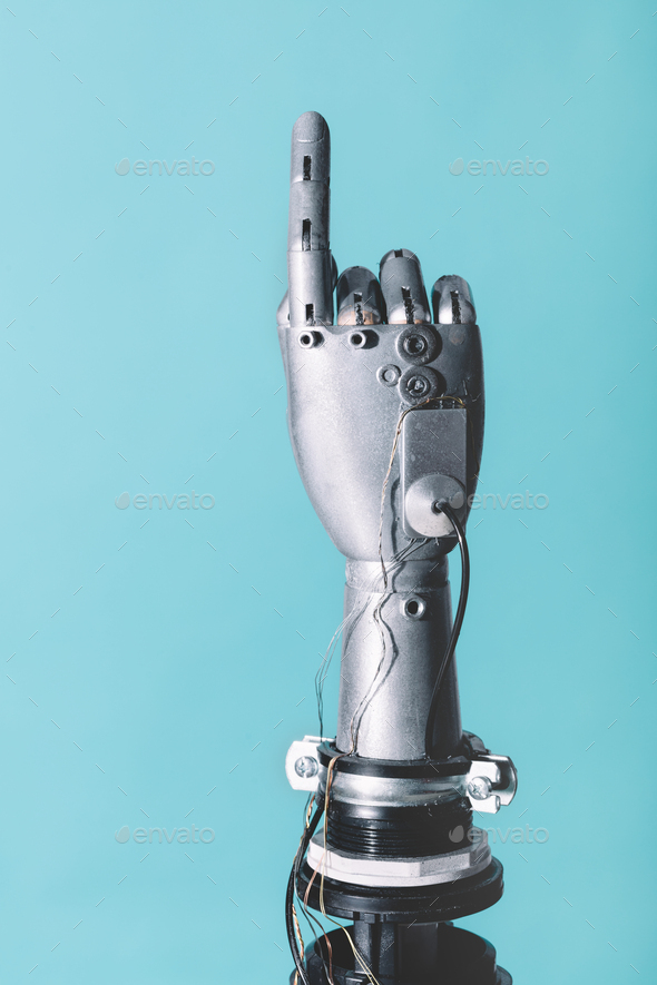 Robotic hand in retro future style pointing finger