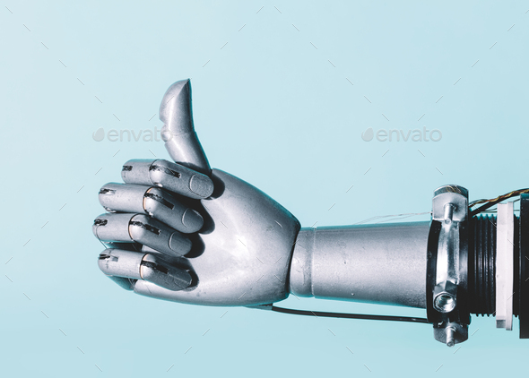Robotic hand in retro future style in okay gesture