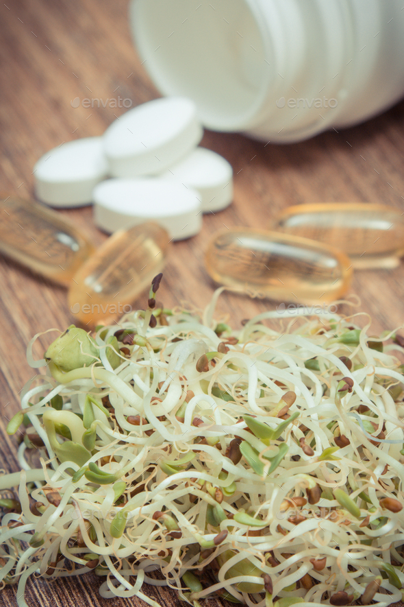 Sprouts as source vitamins and tablets supplements. Choice between
