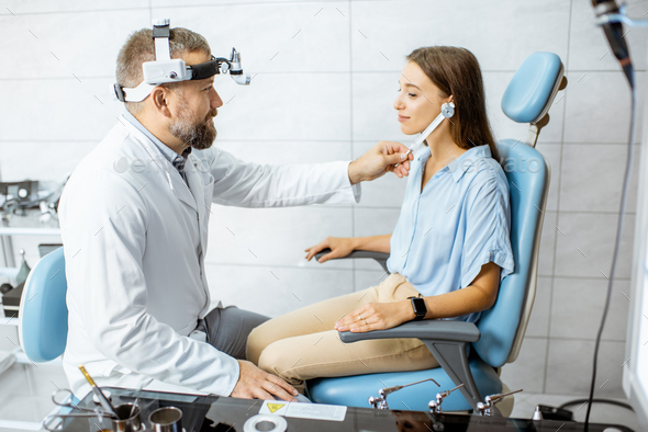 Hearing test with tuning fork Stock Photo by RossHelen | PhotoDune