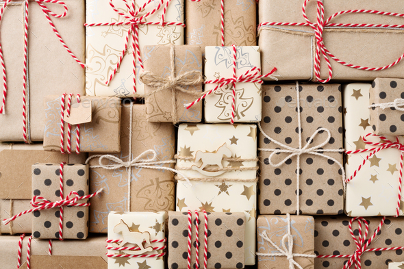 Christmas Background with Christmas Gift Boxes Wrapped in Brown