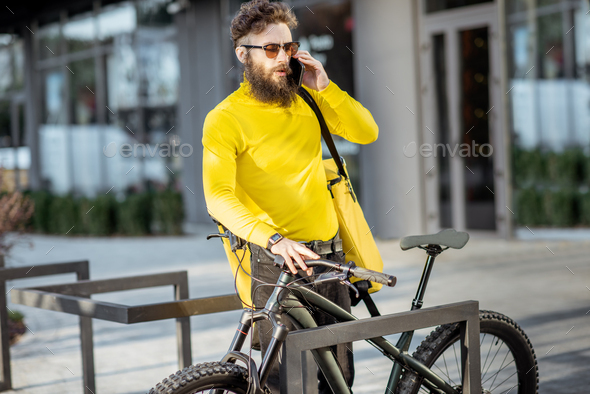 Man delivering food with thermal bag on a bicycle
