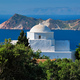 View of Milos island and Greek Orthodox traditional whitewashed church in Greece - PhotoDune Item for Sale