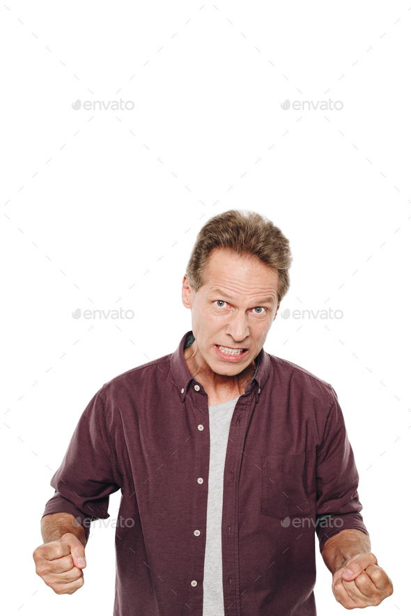 angry man shaking fists and looking at camera isolated on white