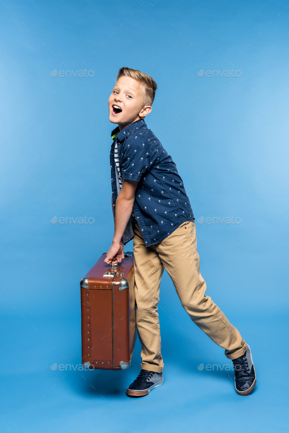 Kid Holding Briefcase Photos, Images and Pictures