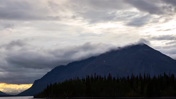 Time Lapse, Beautiful View of Canadian Nature of Lake, Mountains and Trees. Cloudy Sunset. Kathleen Lake, Kluane National Park, Yukon, Canada alt