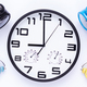 Wall clock isolated at white  background. Office alarm clock view - PhotoDune Item for Sale