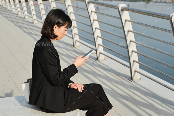 Asian Woman Planning Workday - Stock Photo - Images