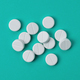Heap of white round medical pills - PhotoDune Item for Sale
