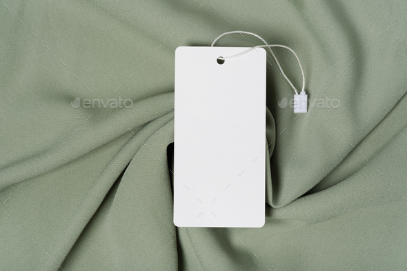 White clothing tag, label blank mockup template with the ribbon, to place your design