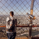 Tourist contemplating Paris from the Eiffel tower - PhotoDune Item for Sale