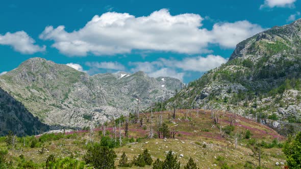 A Time Lapse View of the Accursed Mountains with Clouds in the Grebaje Valley Montenegro alt