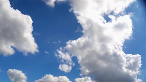 Time Lapse of Clouds rolling across the sky, as they build and disperse when they move by. alt