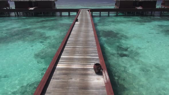 Flying Over Jetty and Tropical Lagoon alt
