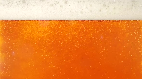 Pouring Cold Beer Into Glass, Closeup, Slow Motion alt