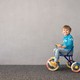 Happy child riding bike. Christmas holiday concept - PhotoDune Item for Sale
