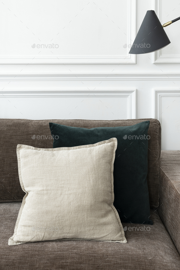 Minimal cushion cover in white on a sofa