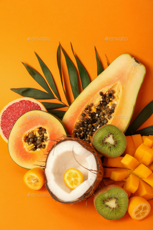 Set of exotic fruits on orange background
