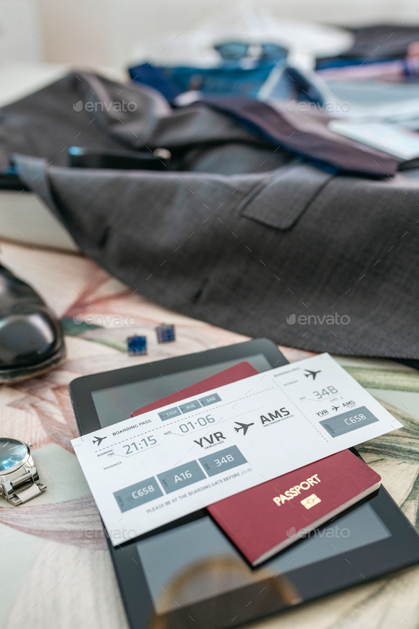 Business trip preparations with boarding pass - Stock Photo - Images