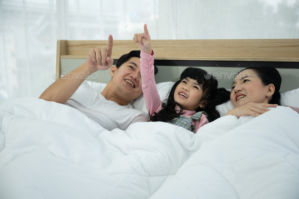 Asian children family with father and mother at home, little girl ...