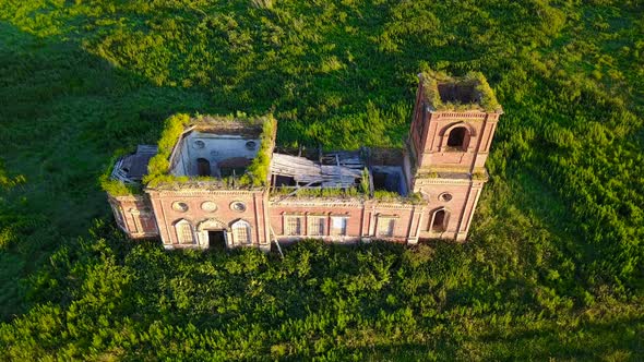 Abandoned Red Brick Church And A Bird