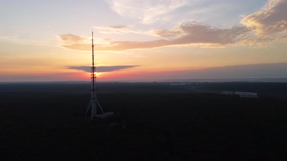 Aerial sunrise epic view forest with telecom tower