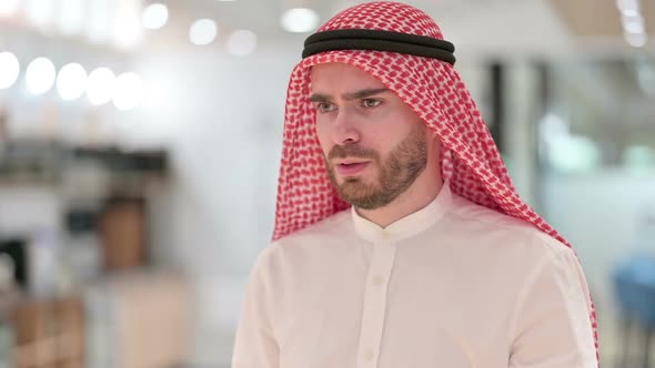 Portrait of Anxious Arab Businessman Waiting Checking Time alt