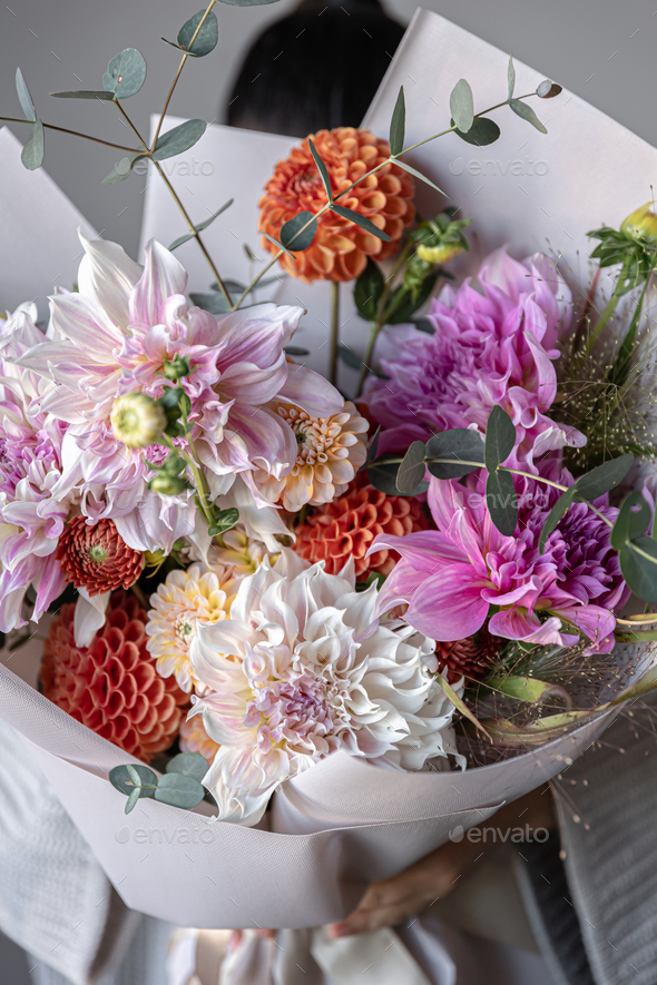 A flower bouquet of cream roses and chrysanthemums on the windows in the  church as a decoration of the holiday. Professional floristics Stock Photo  - Alamy