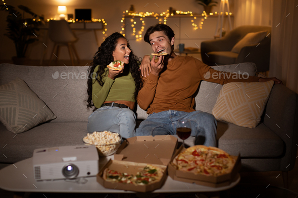 Boyfriend And Girlfriend Eating Pizza Talking Spending Evening Together Indoor