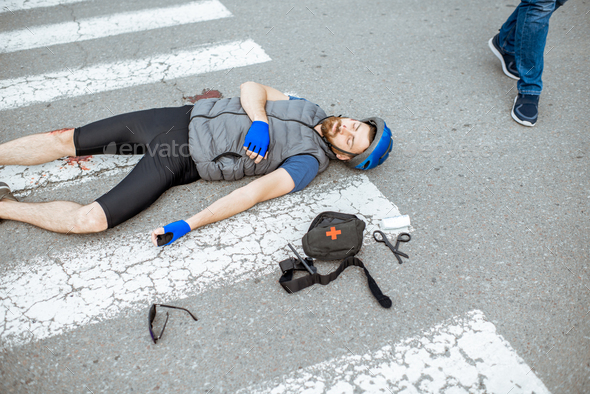 Injured man on the road after the accident